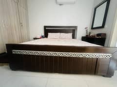Bed with side tables and dressing table with mirror for sale