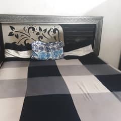 Bed and sitetables and  wardrobes
