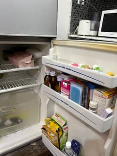 Haier fridge with freezer small size