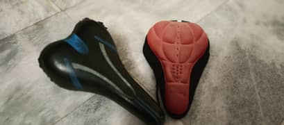 A used bicycle seat and a free seat cover for sale