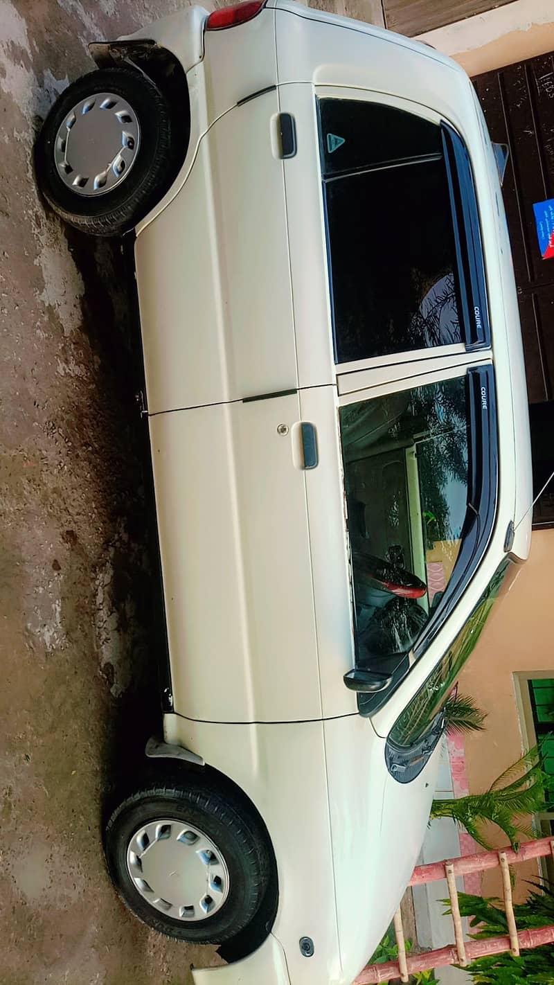 Fully option smart Daihatsu coure 2006 model car with all feature's 2