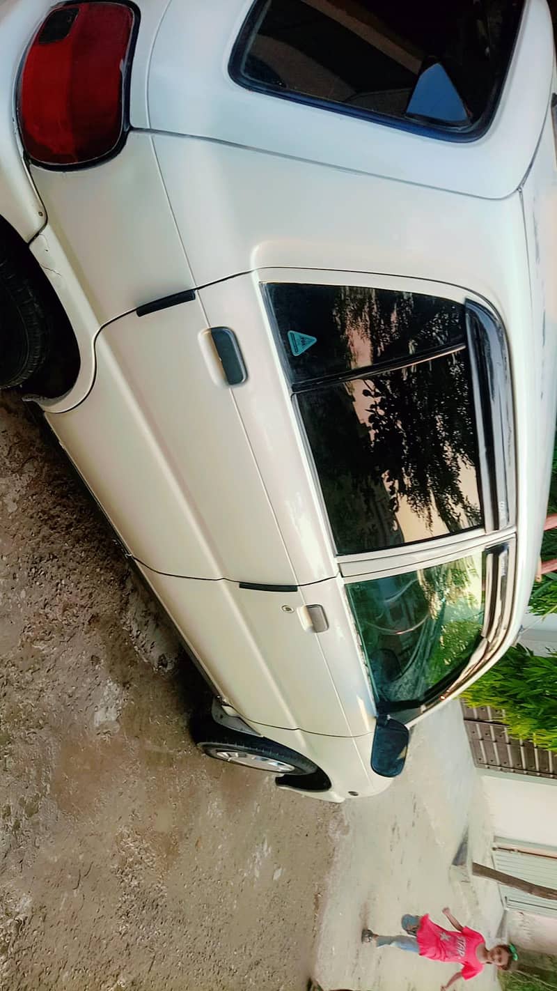 Fully option smart Daihatsu coure 2006 model car with all feature's 11