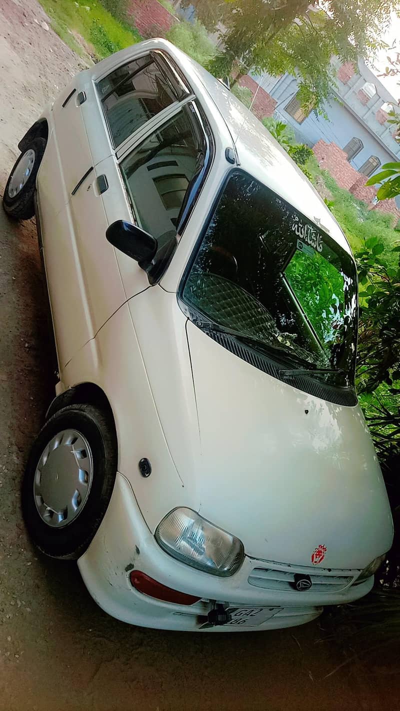 Fully option smart Daihatsu coure 2006 model car with all feature's 15