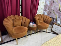 2 Flower shape sofa chairs and 1 table
