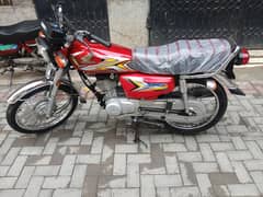 Honda 125 red colour apl  All ok bike ha brand new condition