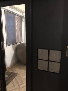 Bed and cupboard