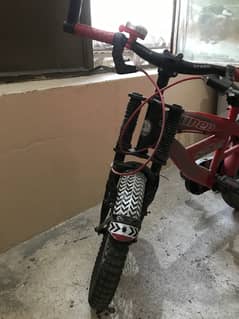 Kids bicycle with support wheels