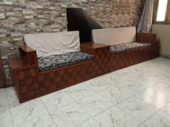 Custom Wooden Sofa with Blue Floral Cushions