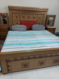 Bed with side tables. . .