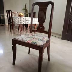 Dining table with 6 chairs. Top 12 mm glass