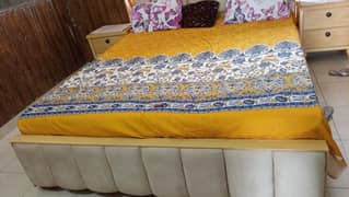 bed and to cupboards
