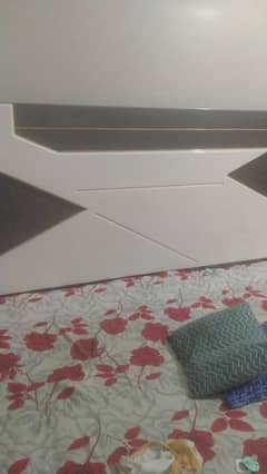 bed with side table