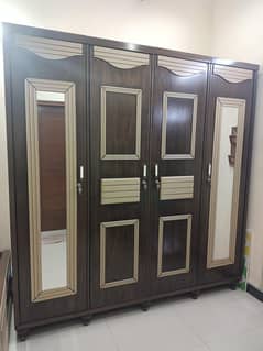 2 single beds. . . one center table. . .   7 × 7 it Cupboard. . .
