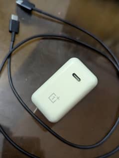 OnePlus original charger. 65watt super fast charging