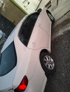 Toyota Corolla Xli 2009 model islamabad register white colour