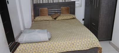 Bed with mattress and iron stand (used)
