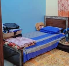Wooden single bed