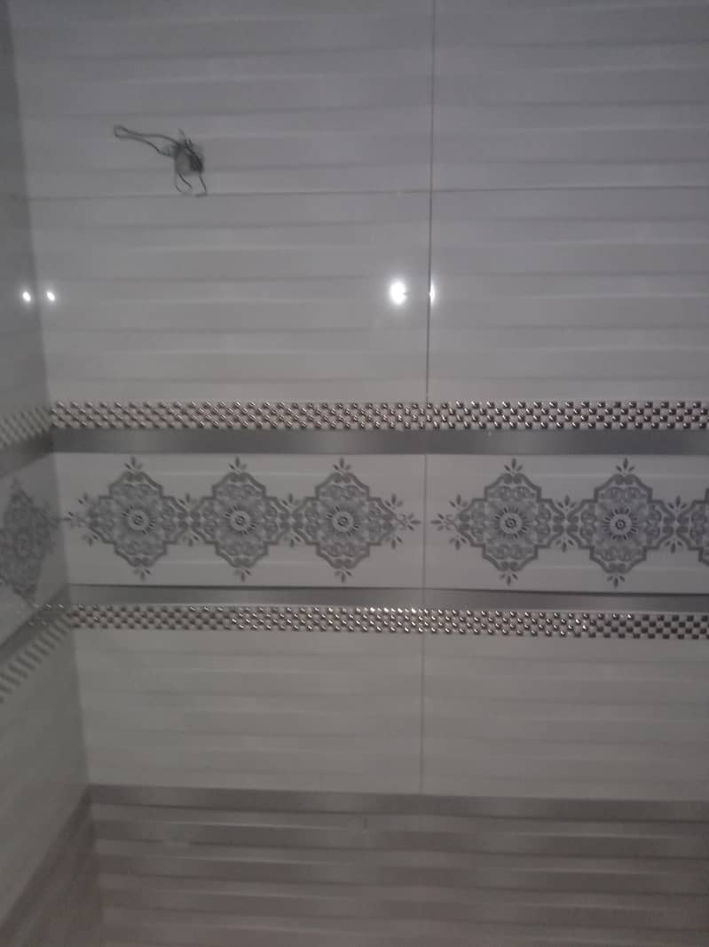 Expert Grey Structure, Tile Fitting & Marble Fixing Services 5