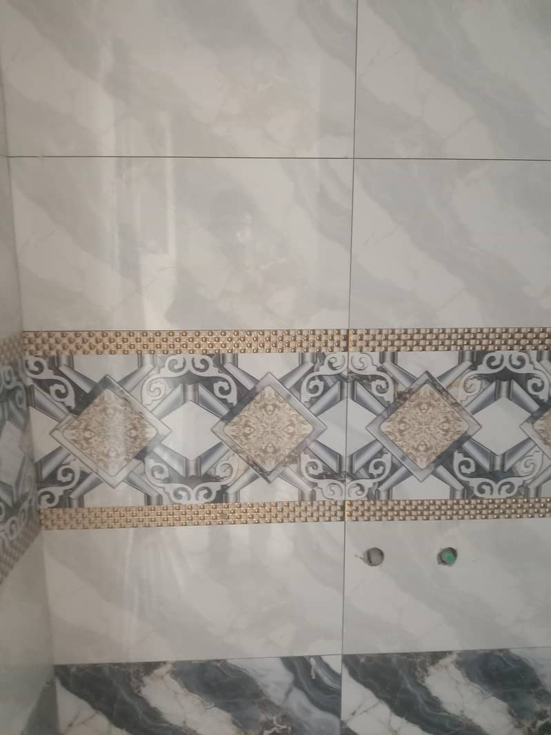 Expert Grey Structure, Tile Fitting & Marble Fixing Services 6