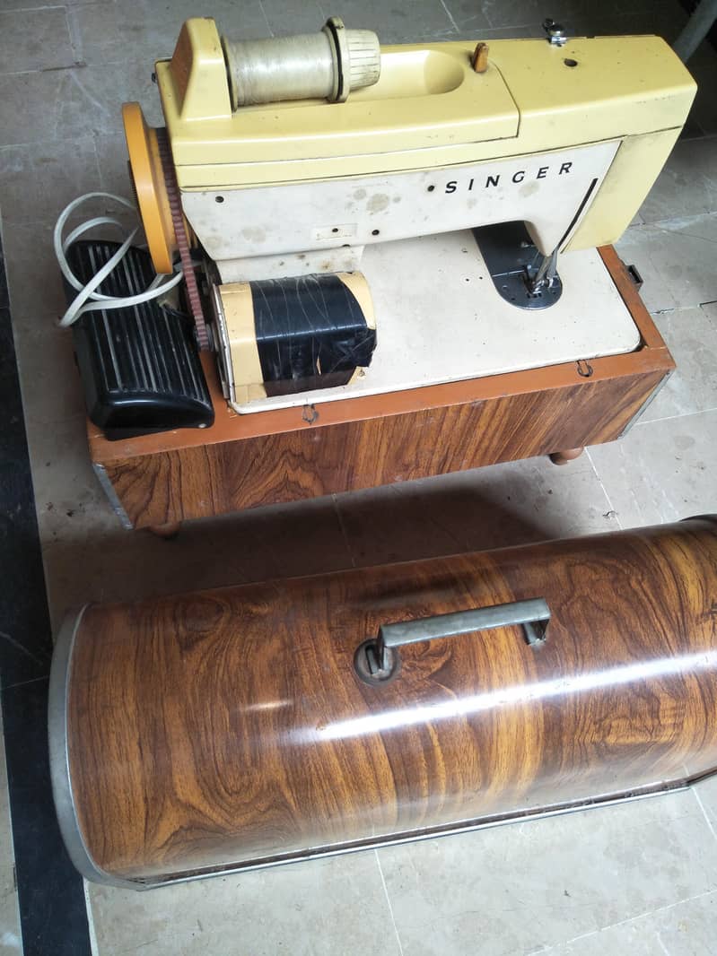 singer machine 1