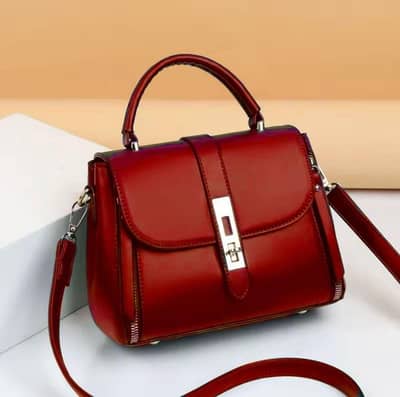  LuxeCharm Multi-Color Handbag – Rs. 2999