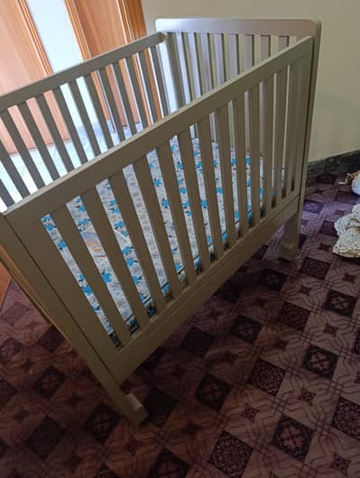 new wooden baby bed with new mattress