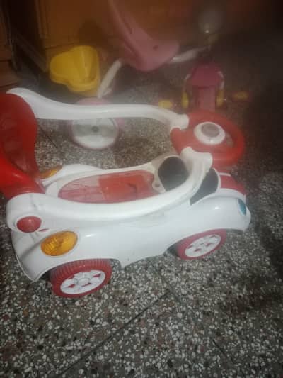 tricycle and car  both in 2000
