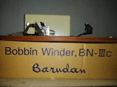 Barudan frames and bobin winder.