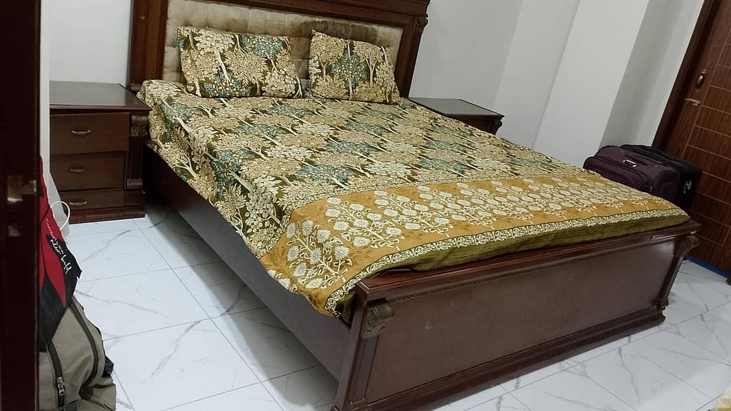 bed with side table 0
