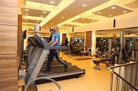 Female gym instructor and receptionist