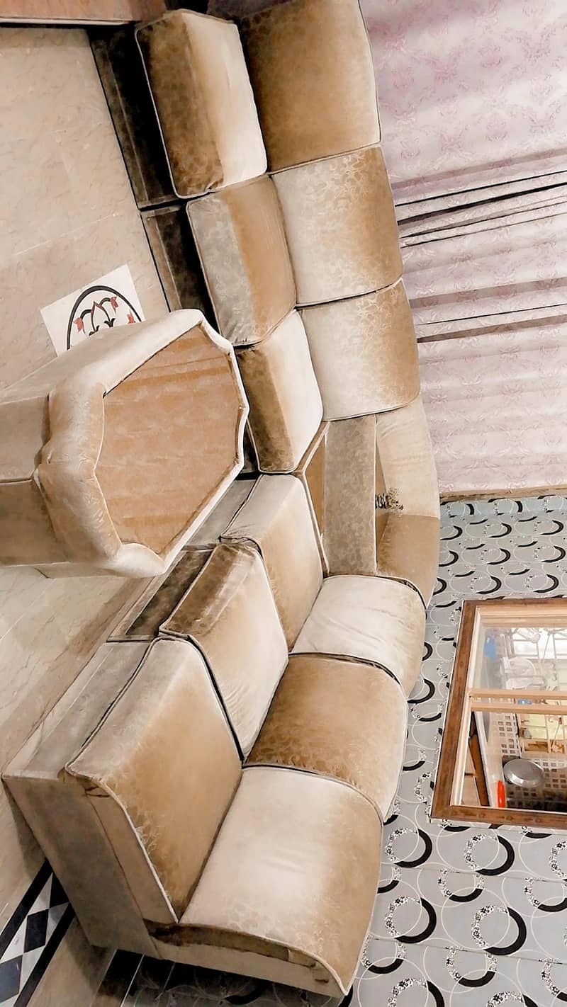 6 seater sofa with a center table and a corner table 1