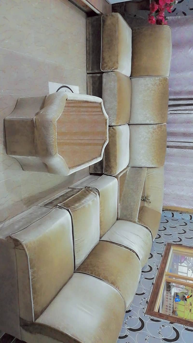 6 seater sofa with a center table and a corner table 2