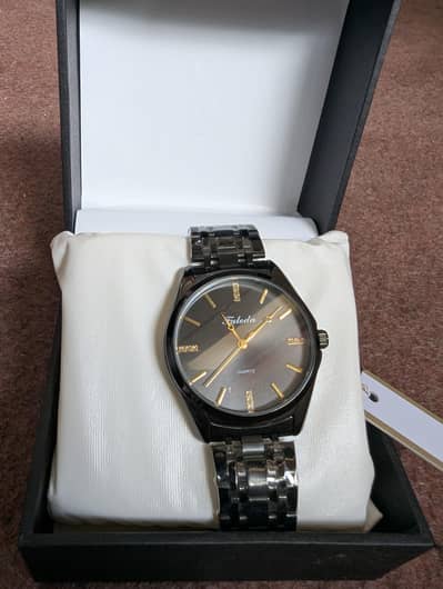 Faleda Men watches . . . Brand new. . . Black and Silver