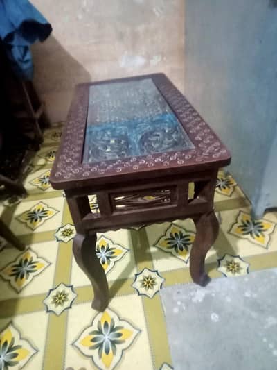 center table with glass carbin work