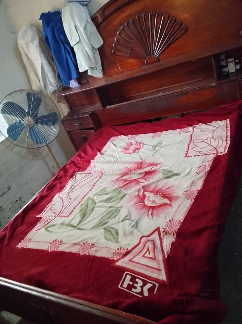 double bed with 2 side table attached 2