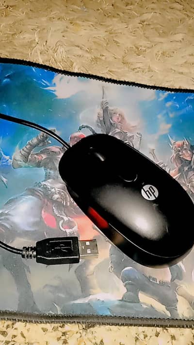 Hp Mouse and  Mouse pad in 10/10 condition