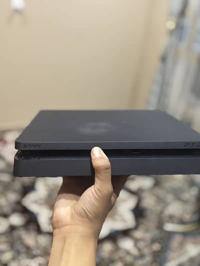 ps4 slim and  and 1 game