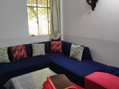 L shape sofa in red colour condition 10/10