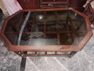 sofa 2 seater respirable Rs. 5000.  and table Rs. 5000