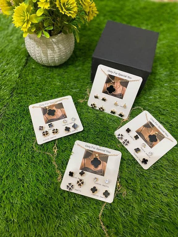 Set of 4 Pairs of Earrings and a Clover Necklace by Clover Necklace