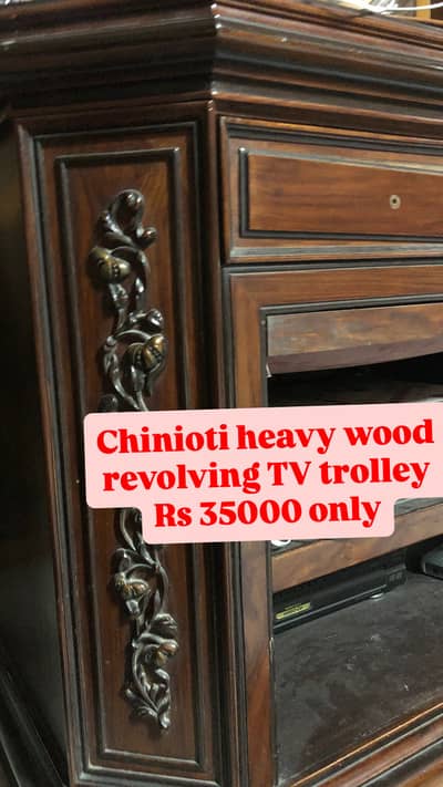 Wooden revolving tv trolley