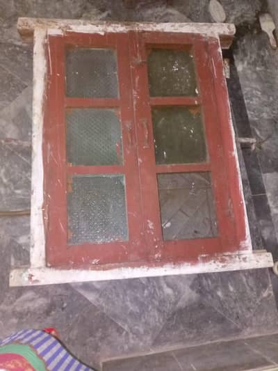 dubble door wooden window with glass closing