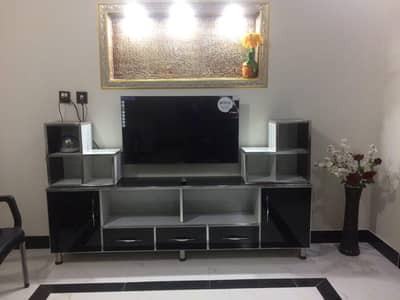 TV CONSOLE