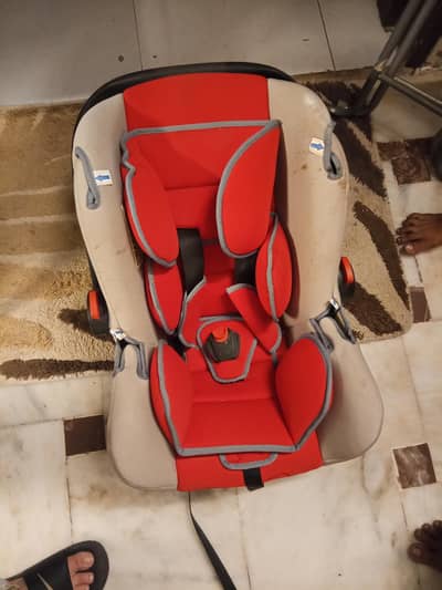 car seat and baby carrycot