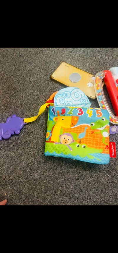 clothe book with rattle and teether