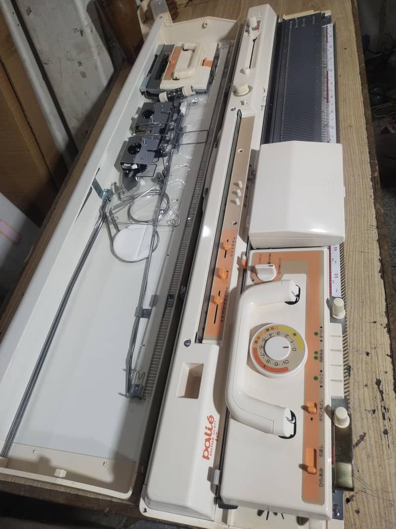 singer knitting machine 10