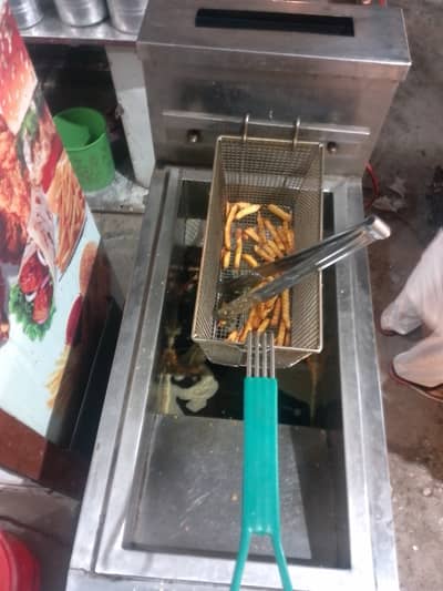 Aslam a Alaikum burger counter and fries machine and potato cuter