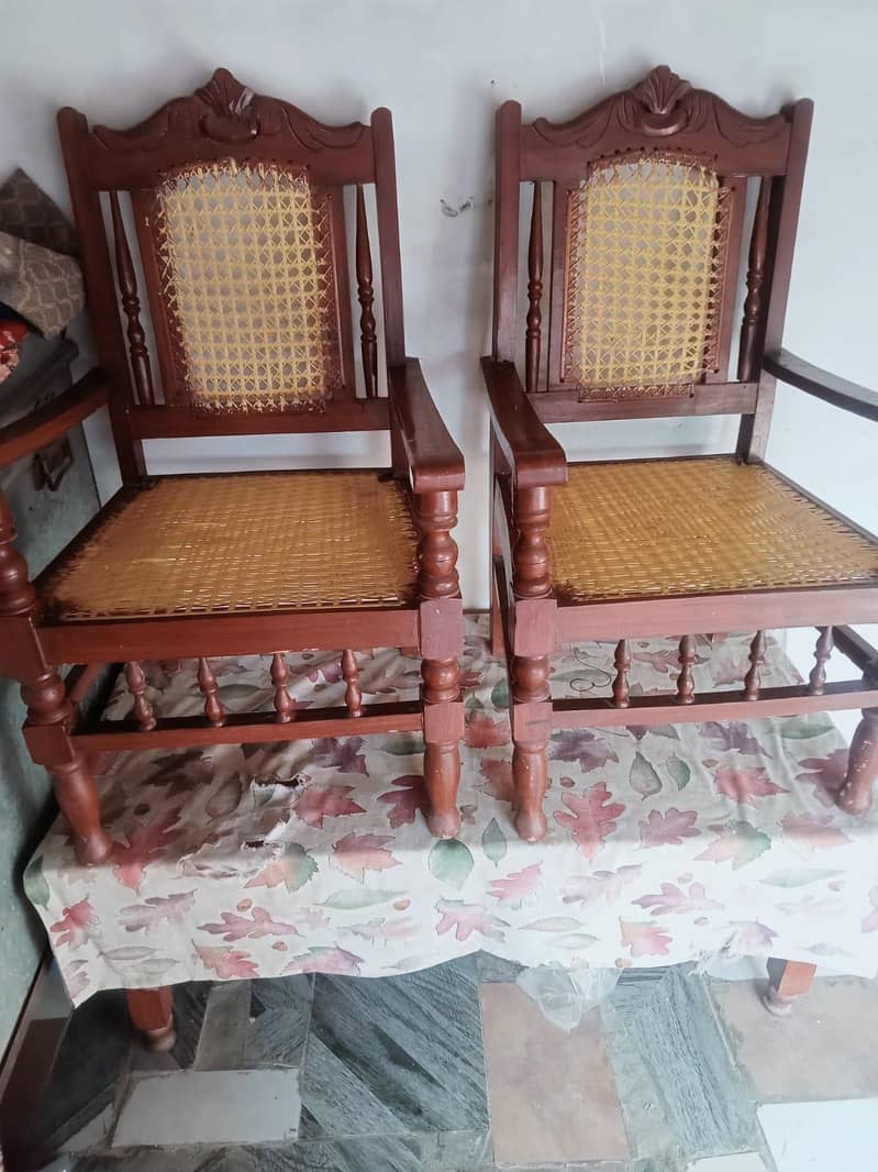 2 chairs. table . . 0