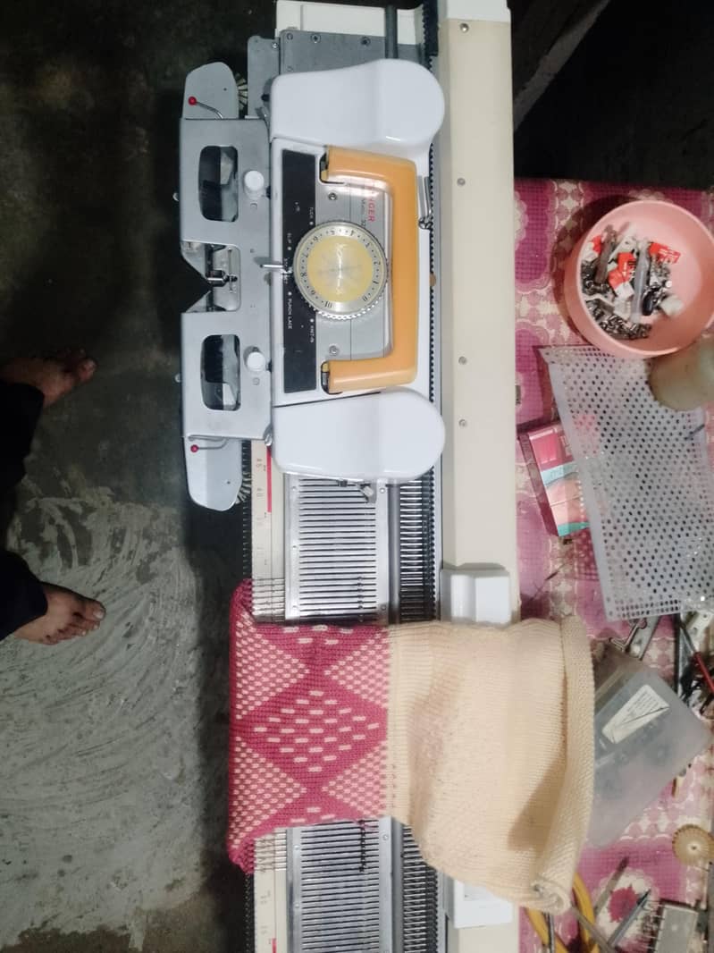 singer knitting machine 10
