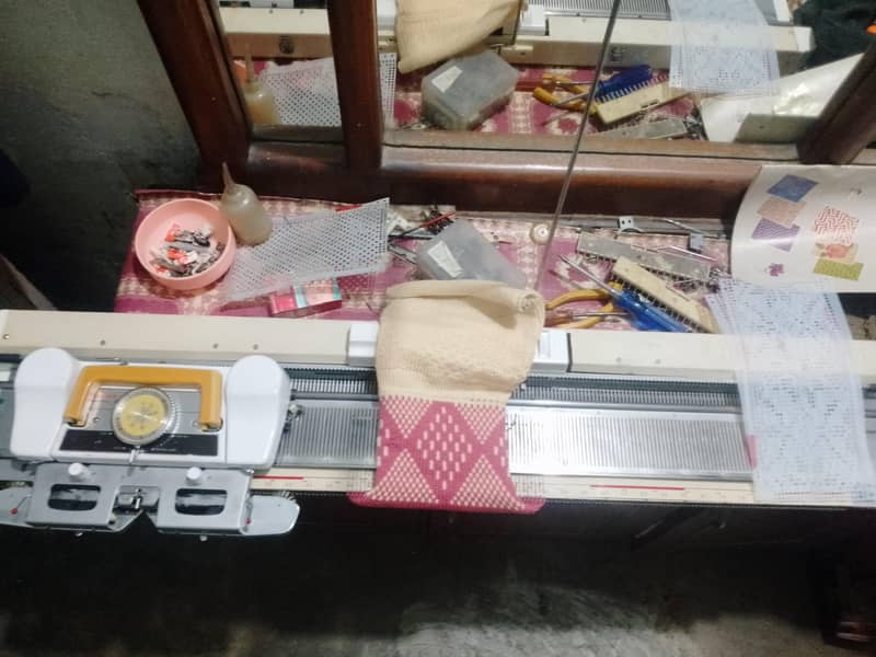 singer knitting machine 11